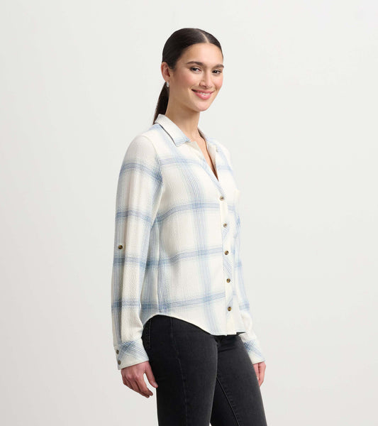 Turquoise plaid button-down shirt with long sleeves and a relaxed fit, featuring a collar and front buttons.