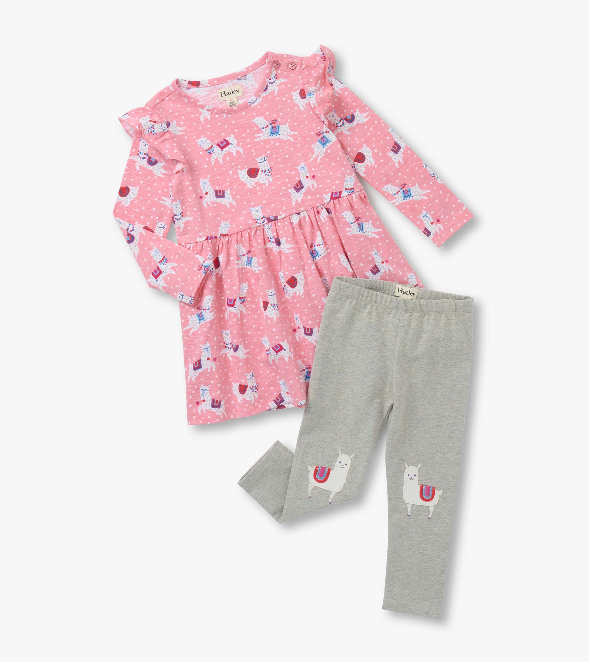 Pink dress with ruffle sleeves and alpaca print, paired with gray leggings featuring alpaca designs on the knees.