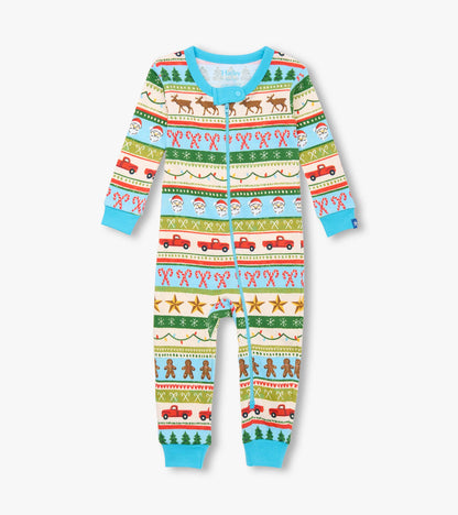 Blue zip-front baby sleeper with holiday Fair Isle print of reindeer, candy canes, trucks, stars, and gingerbread men
