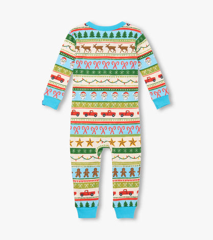 Blue cotton sleeper featuring a fun Fair Isle pattern with festive motifs like trees, reindeer, and gingerbread men.