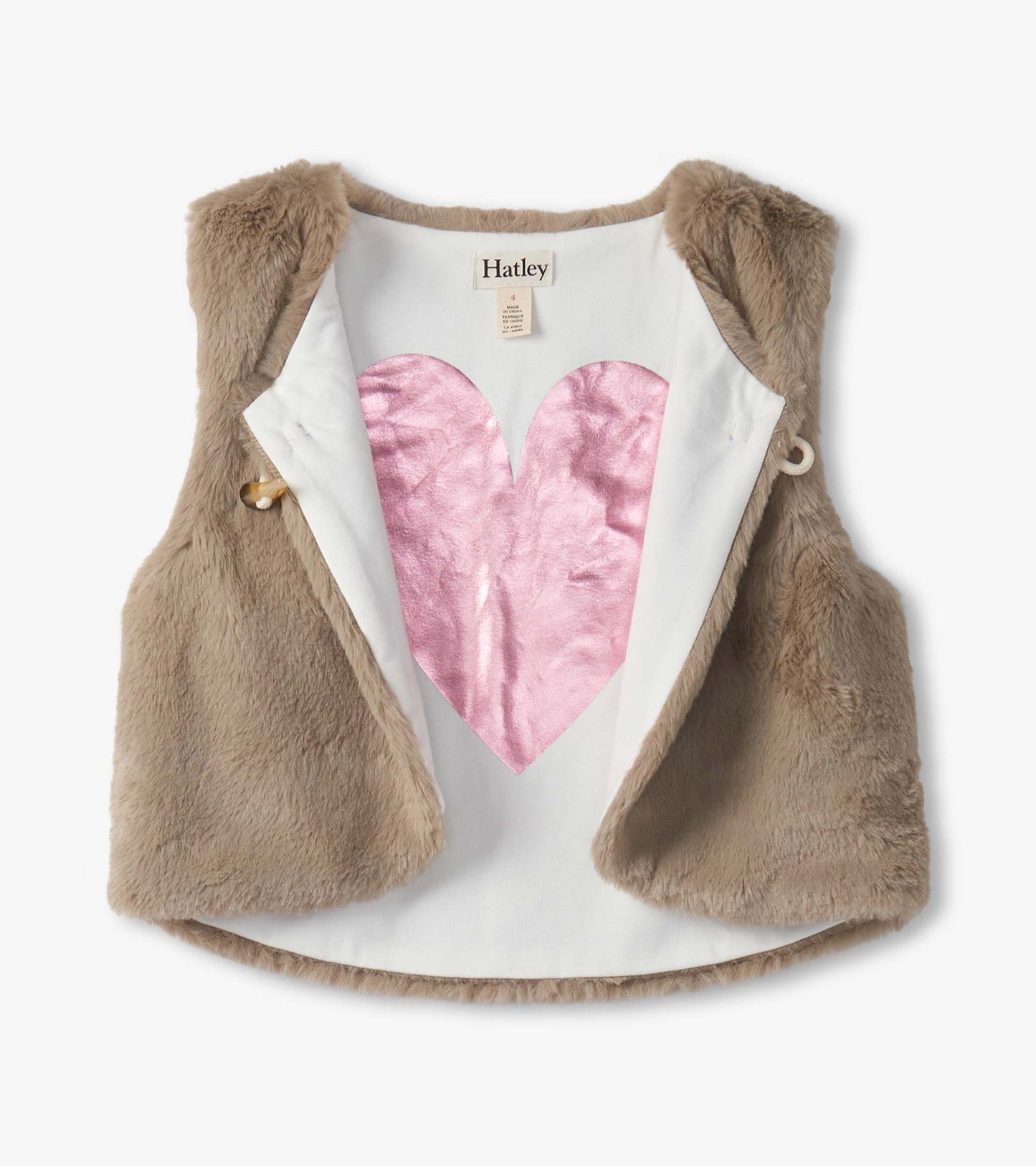 Cropped faux fur vest in beige with a pink heart lining, featuring an open front and soft texture.