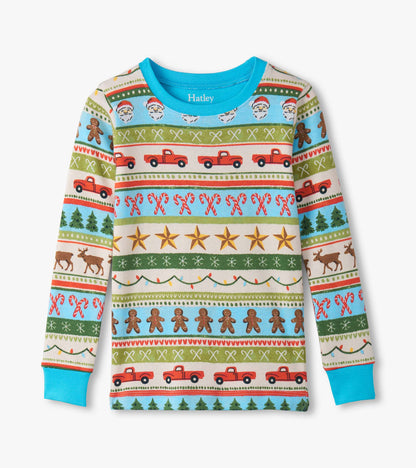 Boys' blue cotton pyjama top featuring a festive Fair Isle pattern with trucks, trees, and holiday motifs.