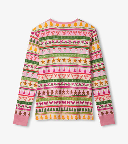 Colorful pink cotton pyjama top featuring a festive Fair Isle pattern with holiday-themed designs and long sleeves.