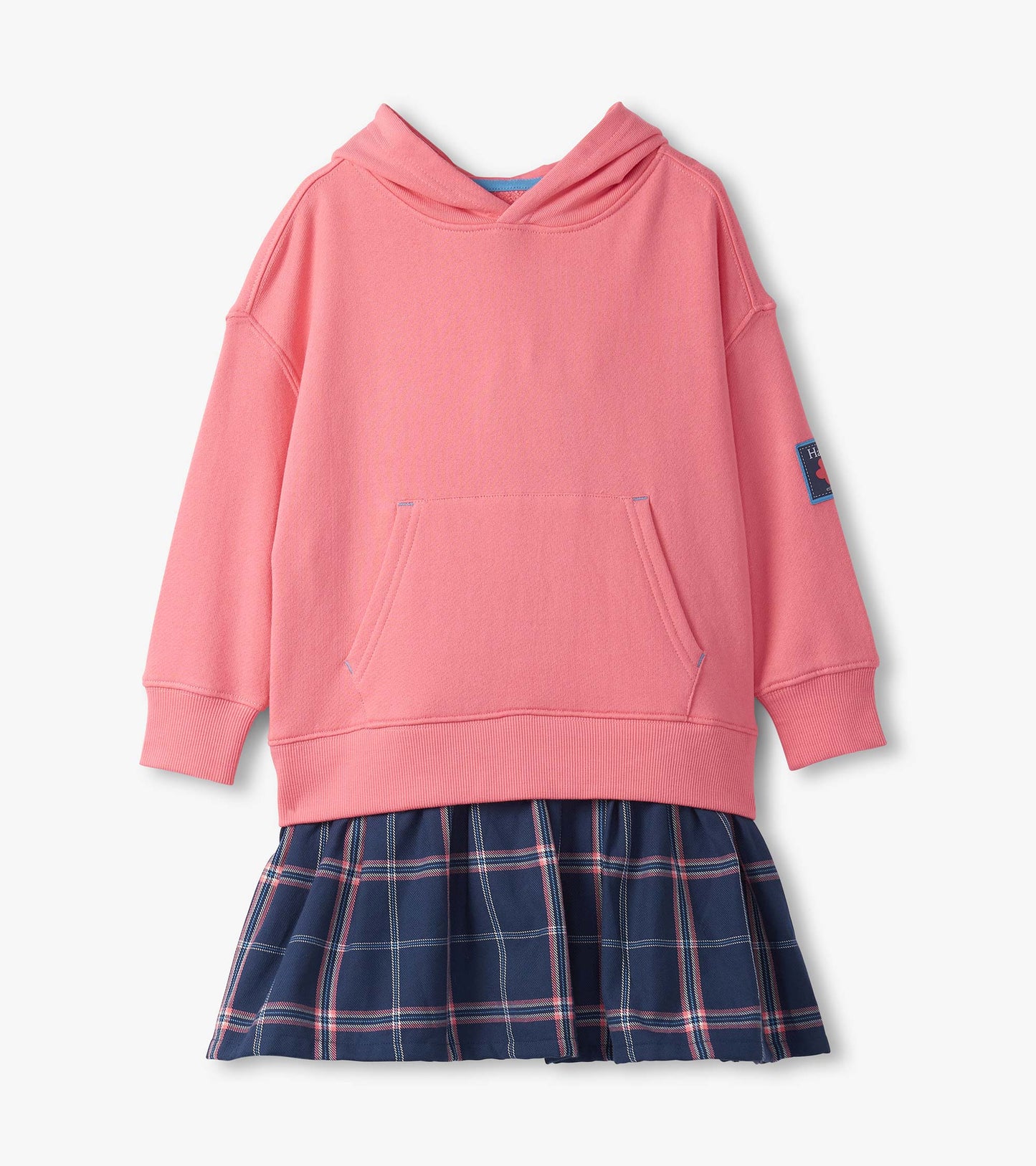 Pink hooded top with a front pocket, paired with a navy plaid skirt featuring pleats.