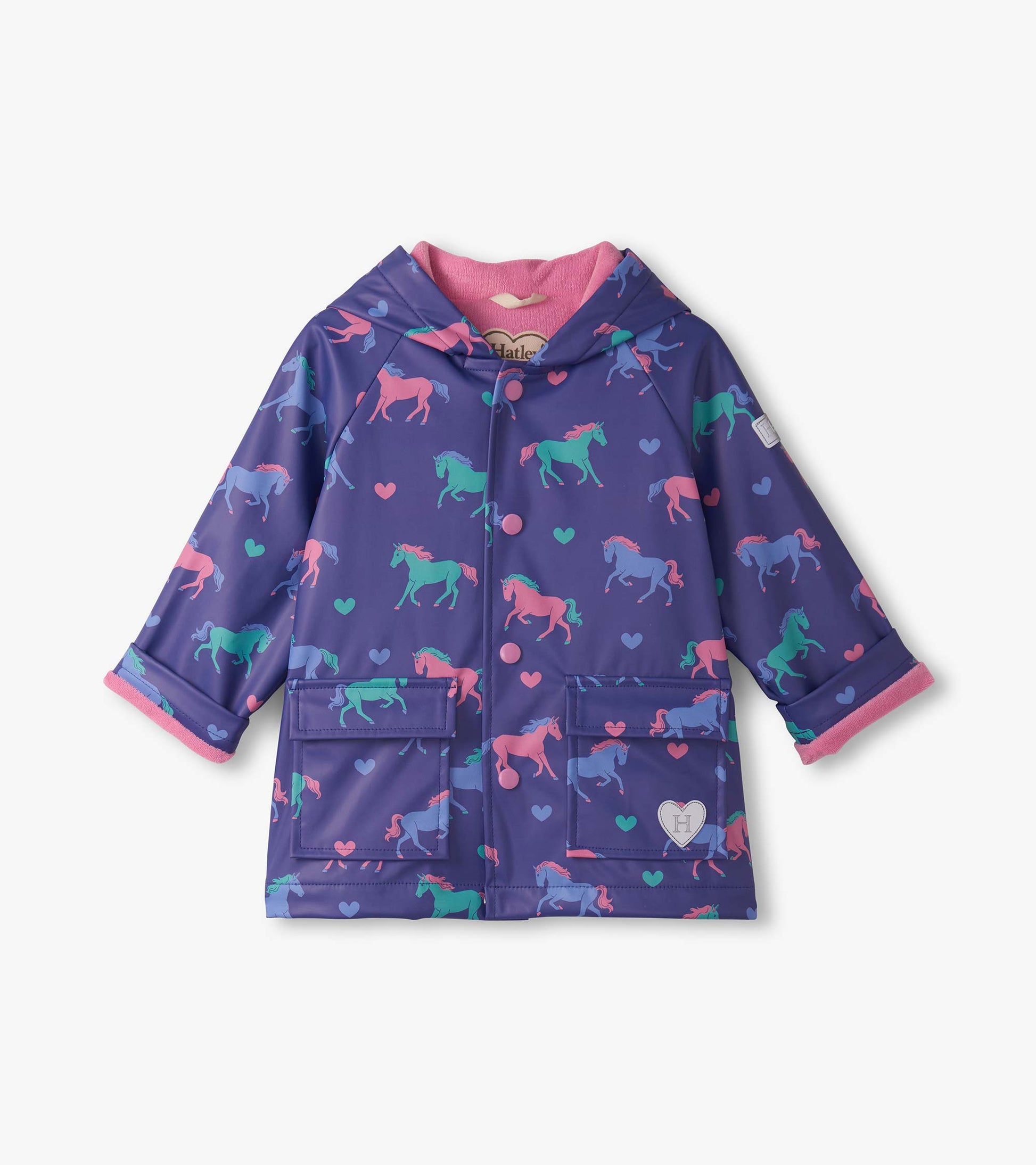 Purple raincoat featuring colorful horse and heart patterns, with a pink hood lining and front pockets.