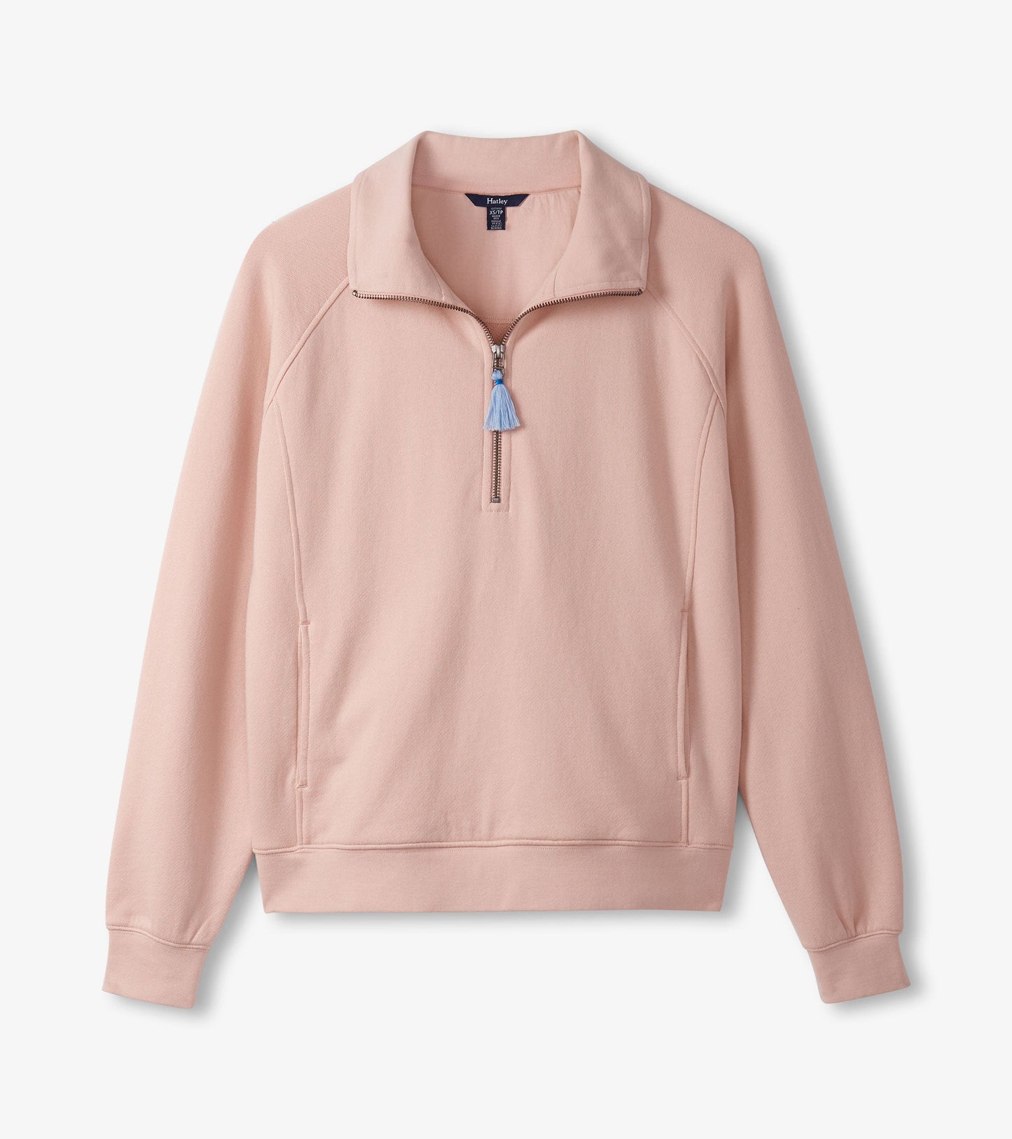 Pink mock neck pullover featuring a half-zip closure and long sleeves, made from soft, comfortable fabric.