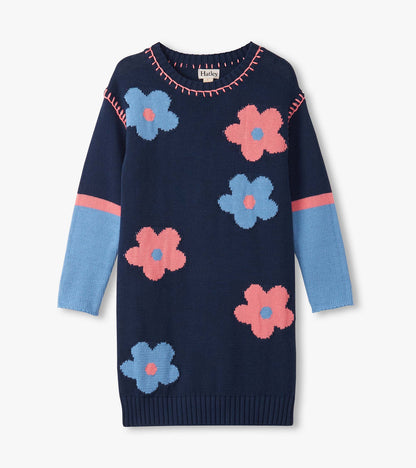 Navy sweater dress with drop shoulders, featuring colorful flower patterns and contrasting blue sleeves.