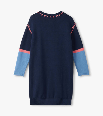 Navy sweater dress with drop shoulders, featuring light blue and pink striped sleeves and a ribbed hem.
