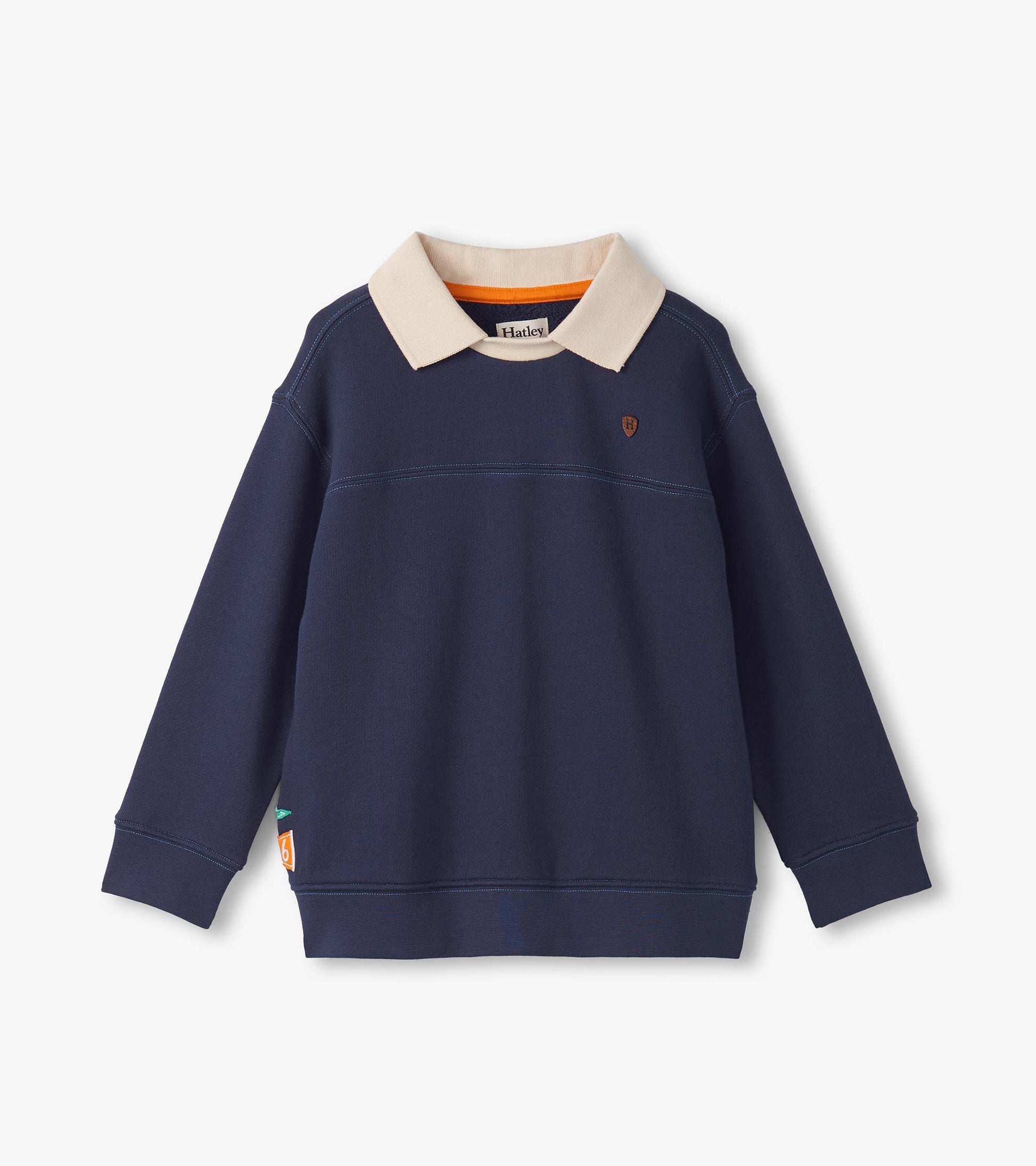 Patriot blue pullover with a cream collar, featuring long sleeves and a small emblem on the chest.