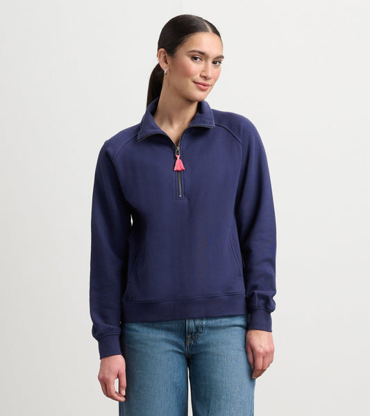 Patriot blue mock neck pullover with a half-zip and tassel detail, featuring long sleeves and a relaxed fit.