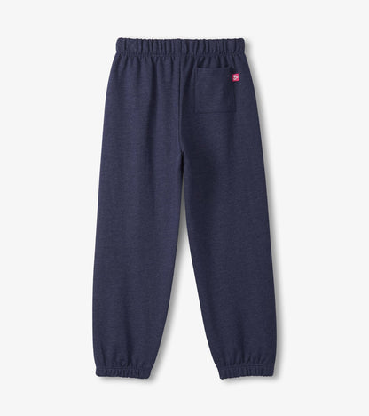 Patriot blue baggy track pants with an elastic waistband and a back pocket, designed for comfort and casual wear.