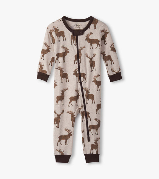Beige cotton sleeper featuring a stag print, with long sleeves and a zip closure, suitable for baby boys.