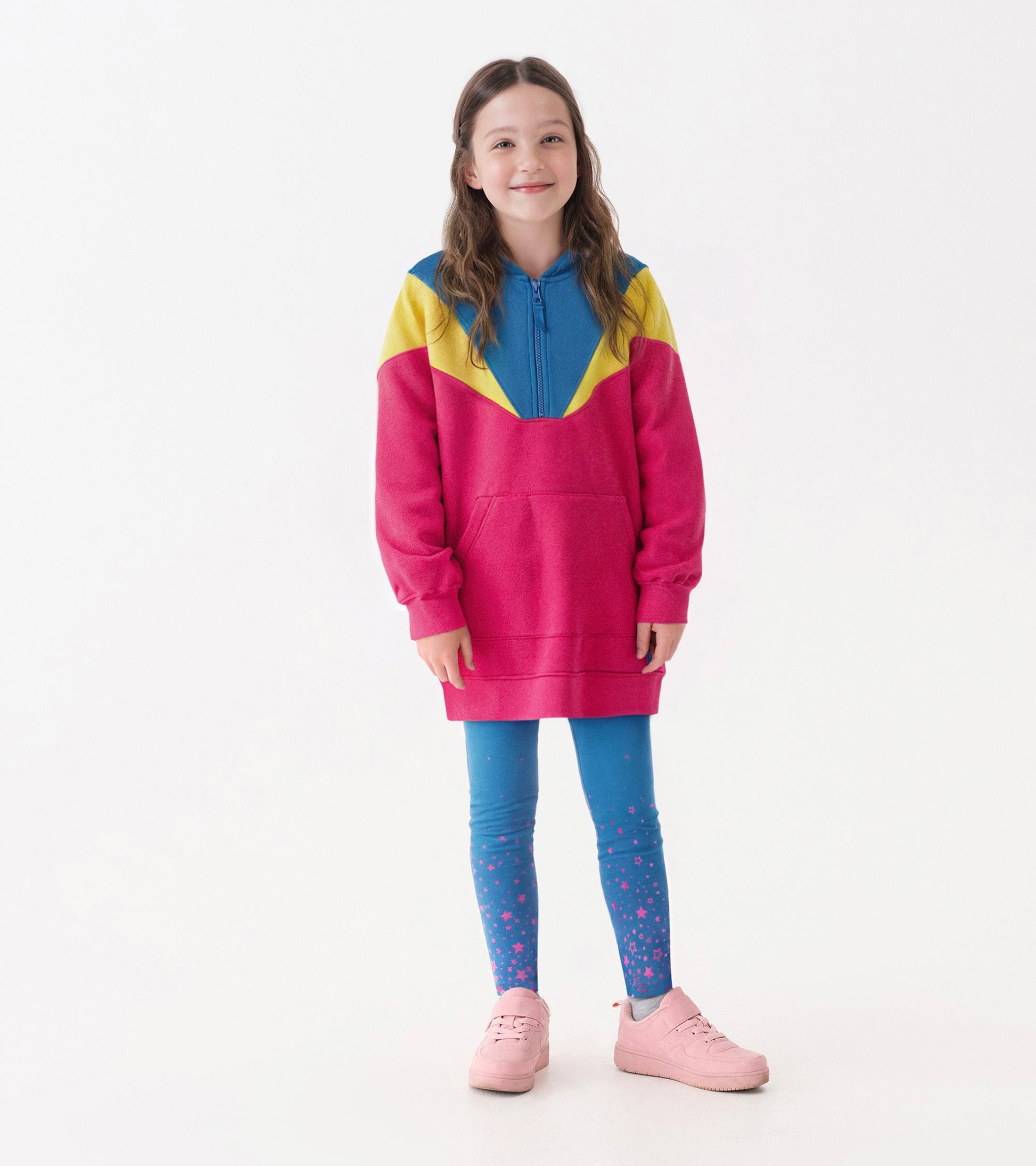 Color block half-zip dress in pink, blue, and yellow, paired with blue leggings featuring pink star patterns.