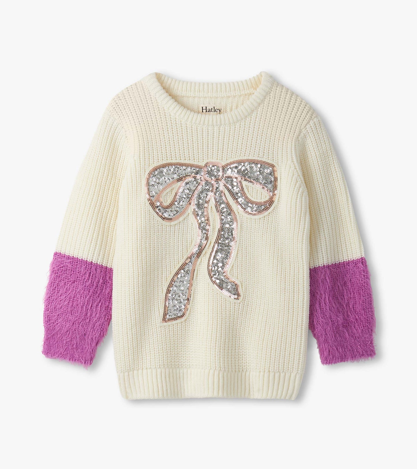 Cream sweater with fluffy purple sleeves and a sequined bow design on the front.