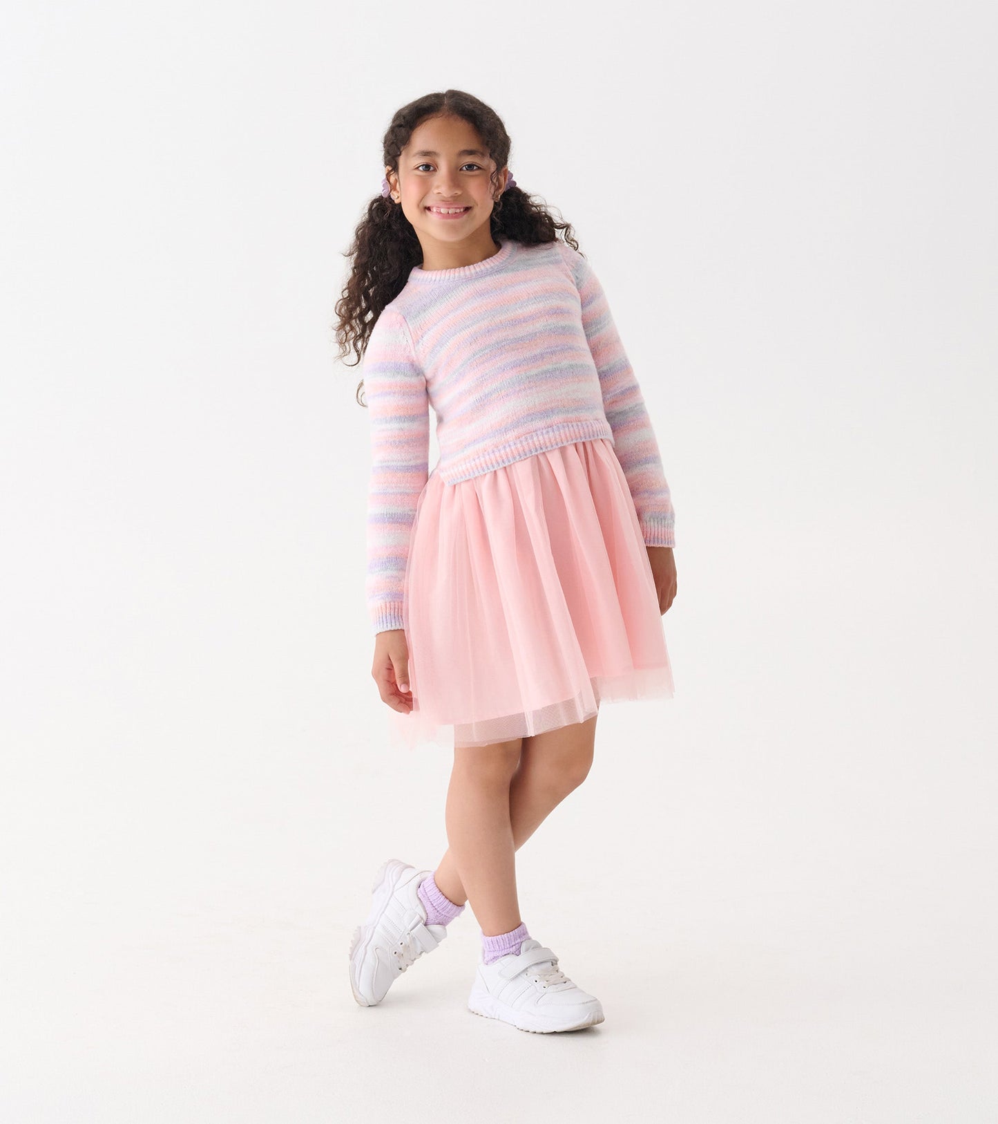 Pastel rainbow striped long-sleeve top with a pink tulle skirt, perfect for casual wear.