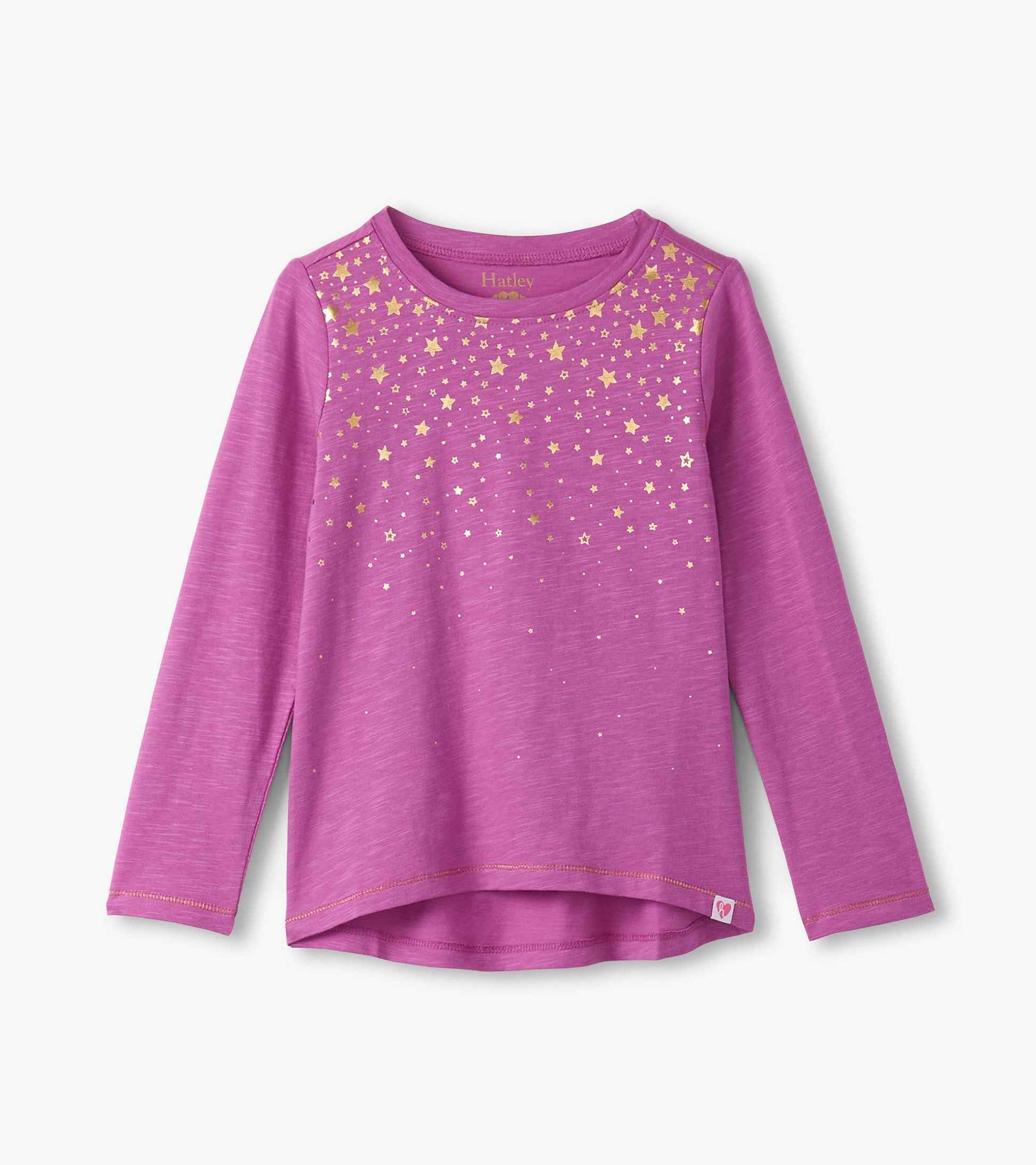Long sleeve pink graphic tee featuring a gold star pattern across the chest. Soft, lightweight fabric.