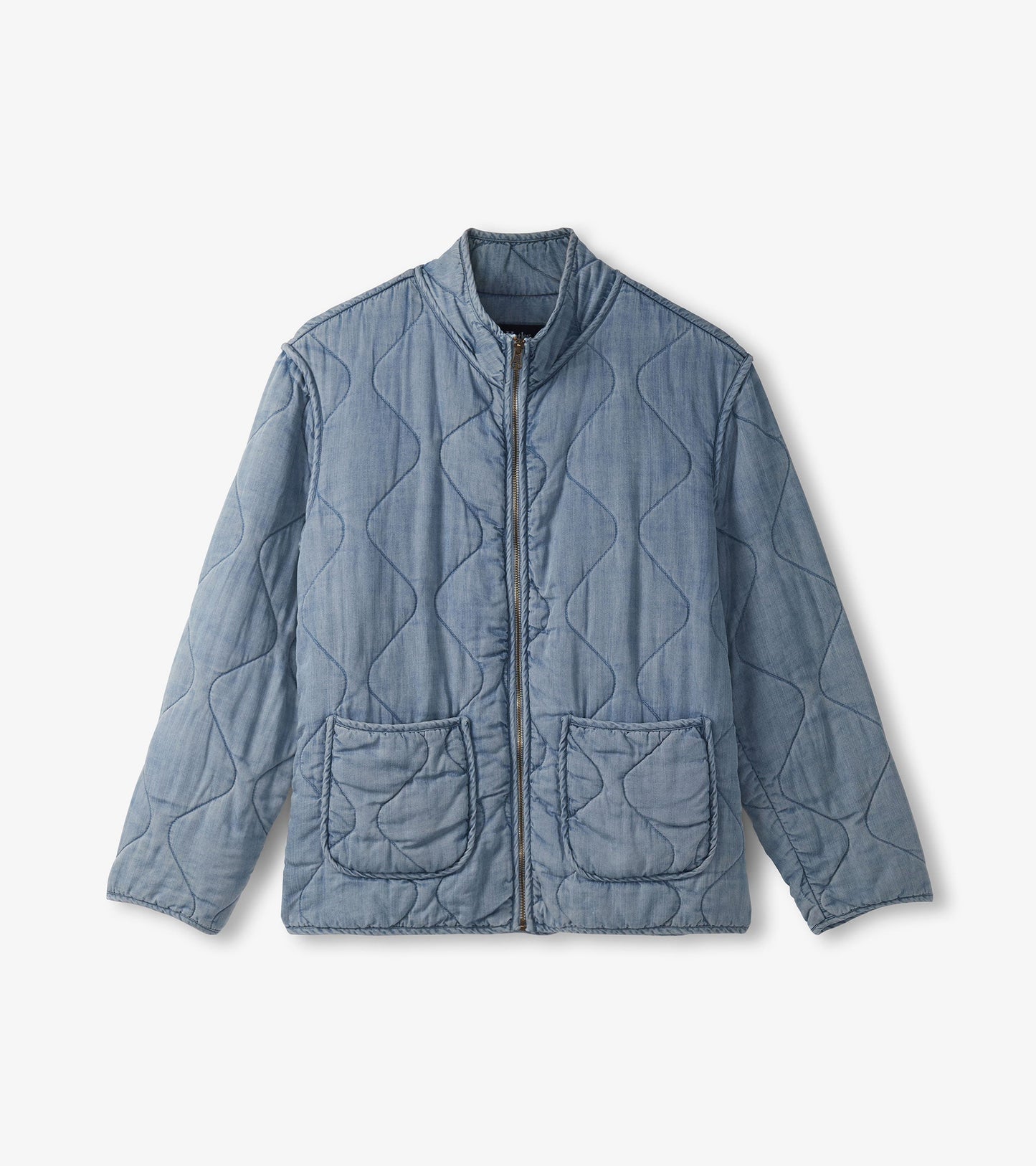 Quilted jacket in washed blue Tencel with a zip front, stand collar, and two front pockets.