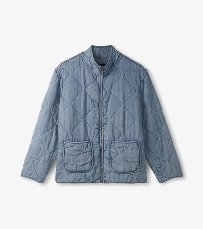Quilted jacket in washed blue Tencel with a zip front, stand collar, and two front pockets.
