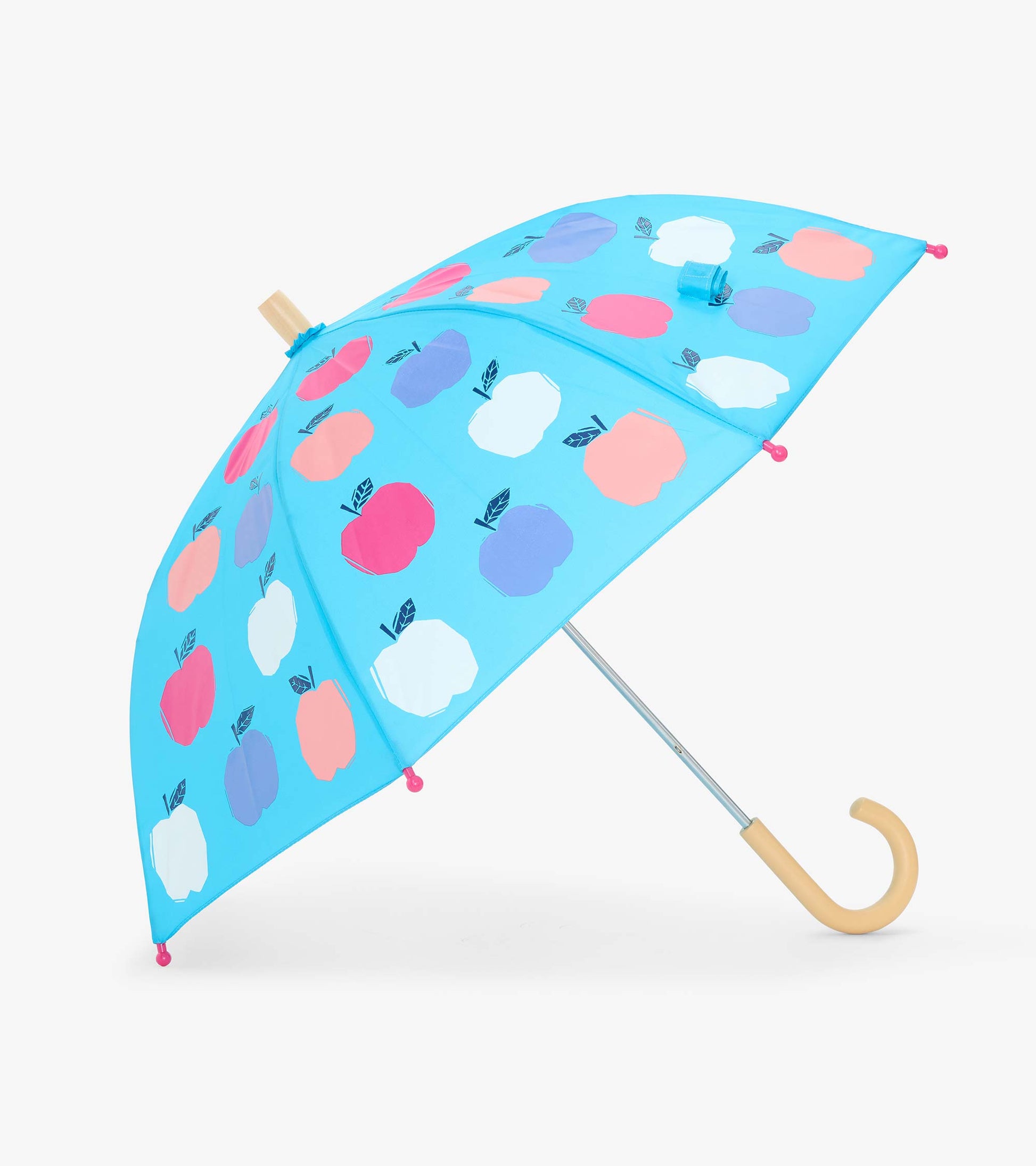 Open kids umbrella with blue canopy, multicolor apple print, pink tips, and curved beige handle