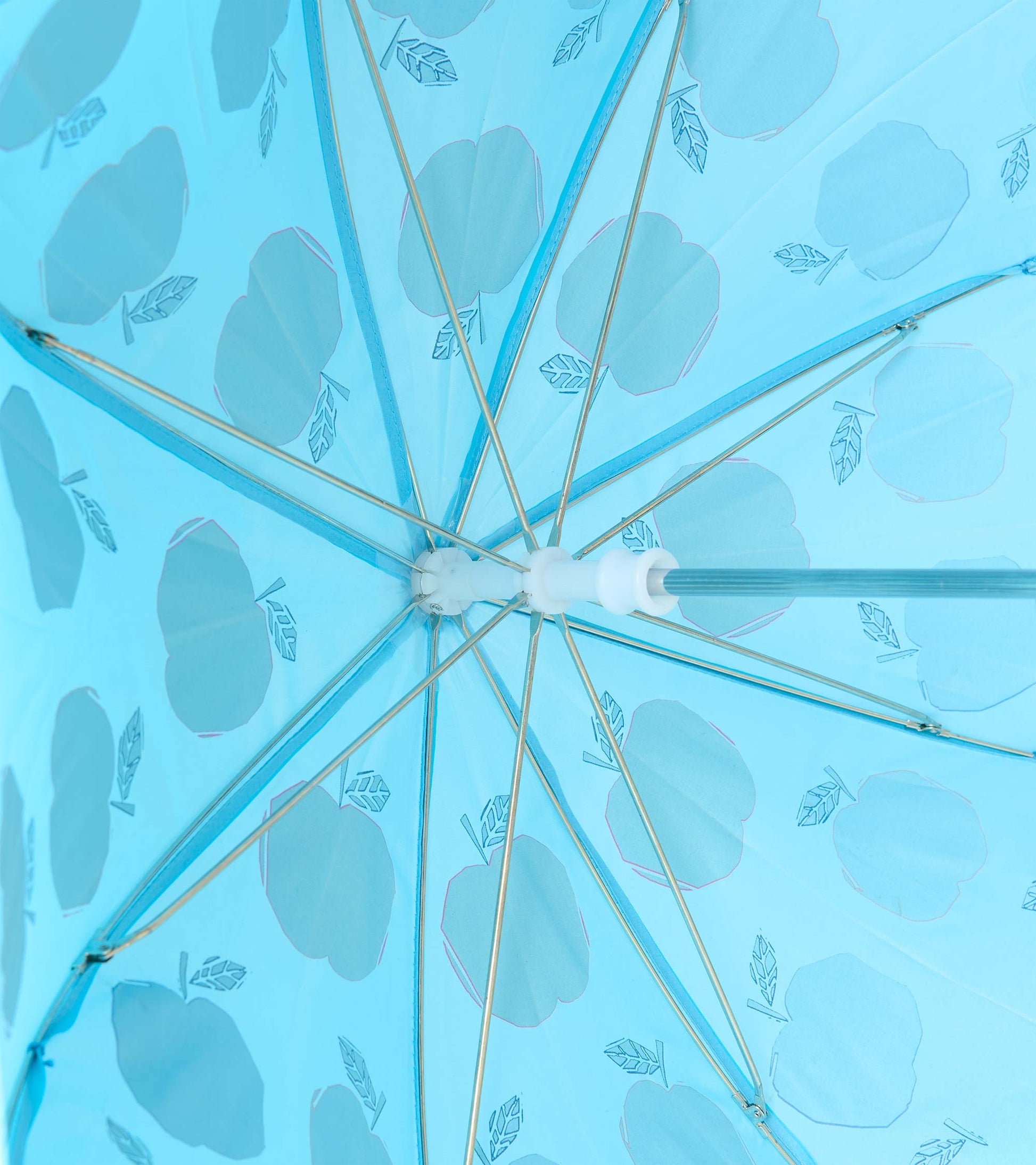 Underside view of blue umbrella showing metal ribs and reverse apple print