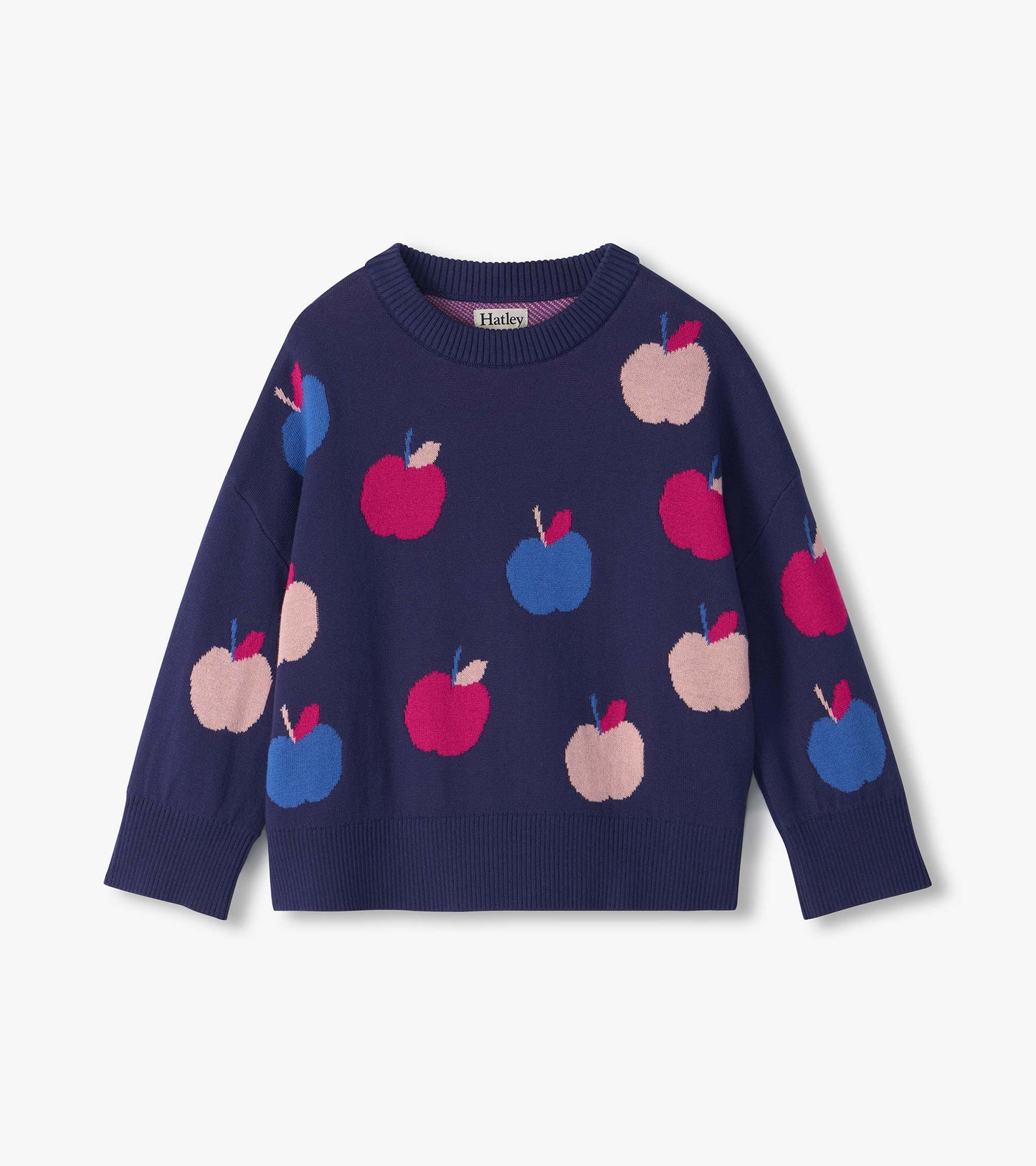 Navy raglan pullover sweater with pink, blue, and light pink apple pattern and ribbed trim