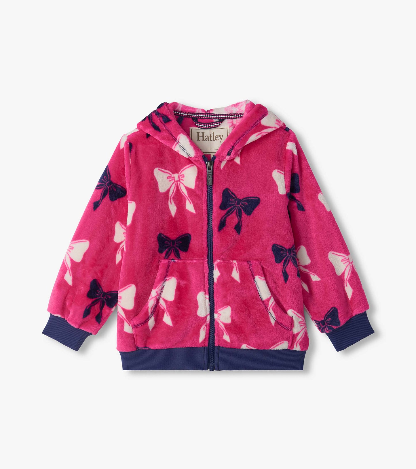 Kids pink zip-up hoodie with hood, front pockets, and white and navy bow print