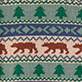View Boys Big Bear Fair Isle Mock Neck Sweater Fair Isle knit pattern with green trees, brown bears, and blue and brown geometric stripes on a cream background