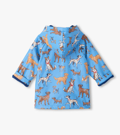 Back view of blue hooded rain coat with allover dog print and blue lining at cuffs