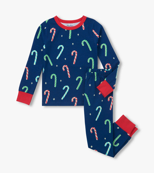 Two-piece boys blue pajama set with multicolor candy cane print and red trim at neck, cuffs and ankles