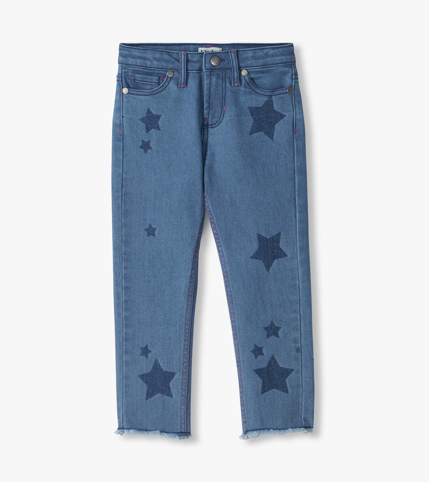 Front view of blue slouchy jeans with dark star print, pink stitching, and frayed hems