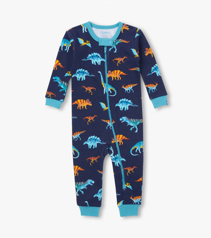 Front view of infant coverall in navy with colorful dinosaur print, teal trim, and asymmetrical zip closure