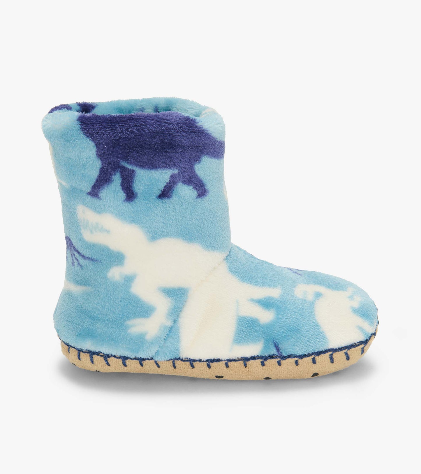 Side view of blue Dino Silhouette fleece slipper with white and navy dinosaur print and tan sole