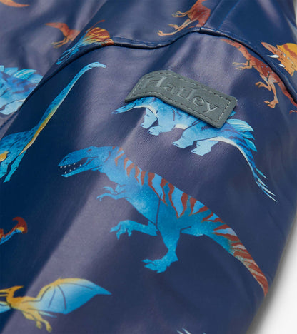Close-up of sleeve with dinosaur print and raised Hatley logo patch