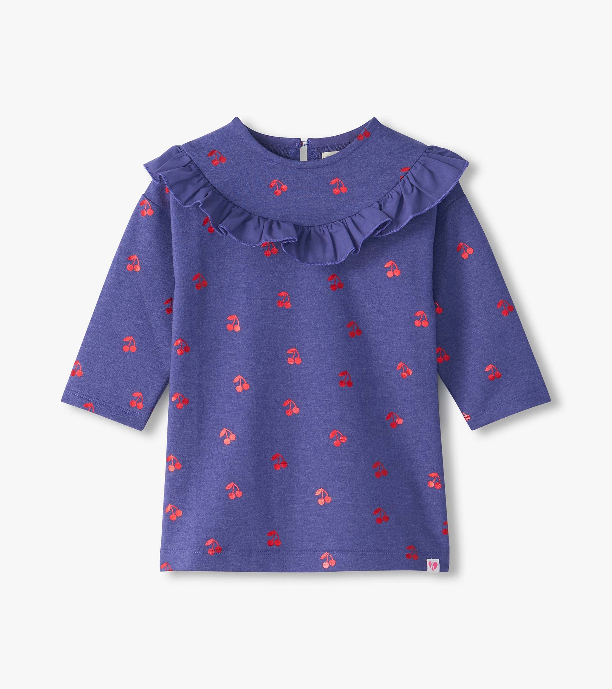 Front view of purple infant dress with red cherry print, long sleeves, and ruffle yoke