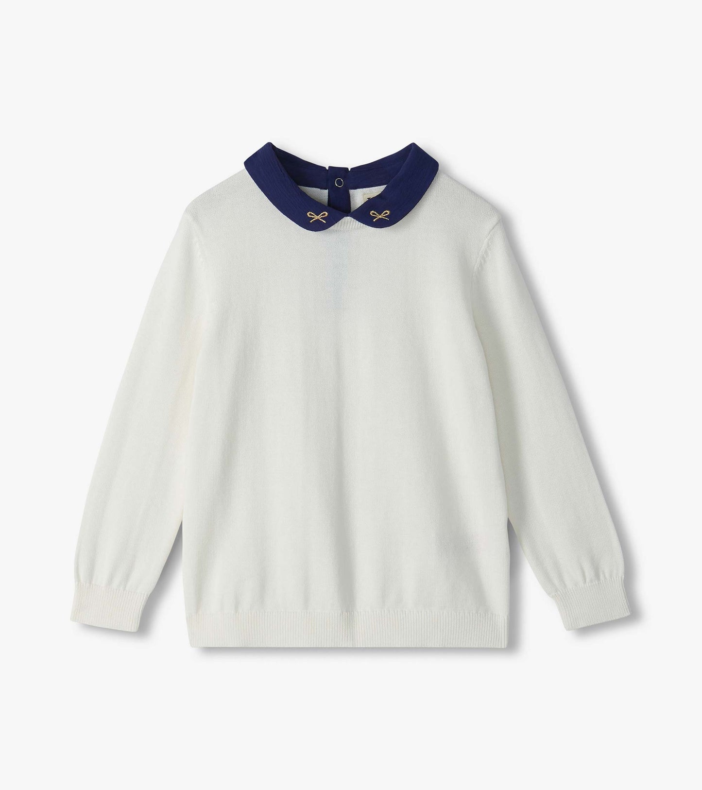 White long-sleeve sweater with navy Peter Pan collar and small embroidered bows