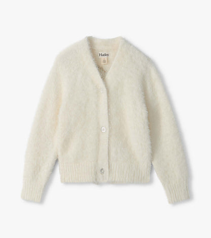 Front view of cream fuzzy cardigan with V-neck, ribbed trim, and shiny button closure