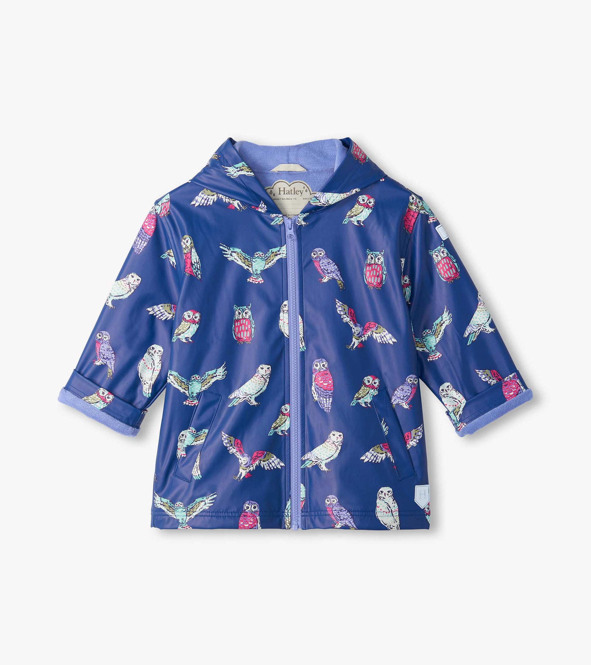 Front view of kids navy rain coat with hood, zipper, pockets, and colorful owl print