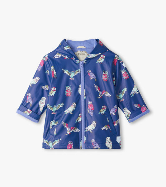 Front view of kids navy rain coat with hood, zipper, pockets, and colorful owl print