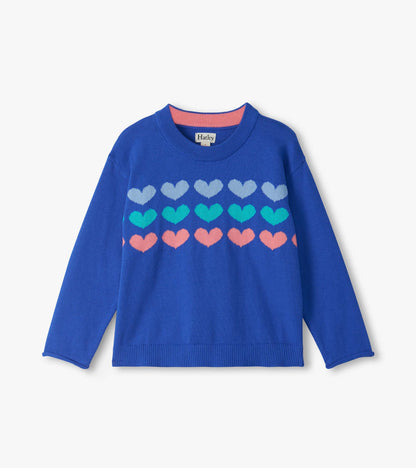 Front view of blue crew neck sweater with rows of gray, teal, and pink hearts across the chest