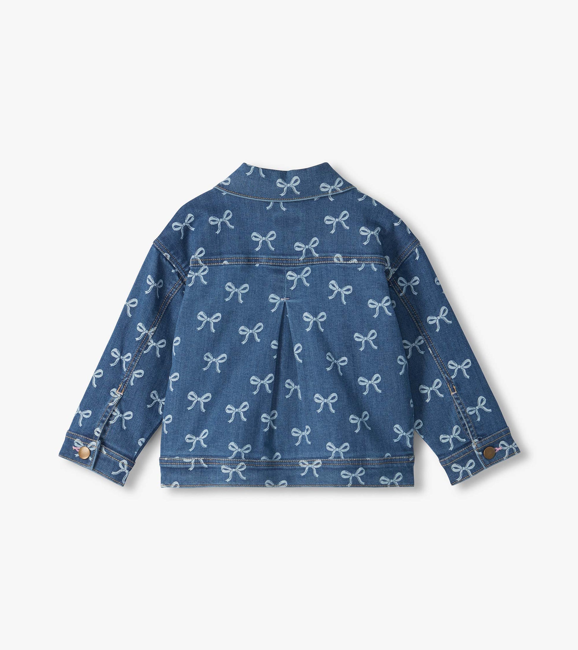 Back view of blue slouchy denim jacket with allover bow print and center back pleat