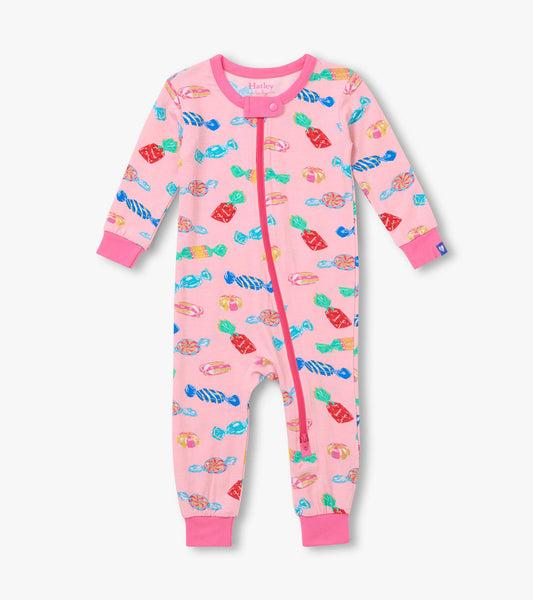 Front view of pink infant coverall with colorful candy print, zip front, and darker pink trim
