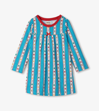 Front view of girls holiday nightdress with red neckline, red bow, and striped festive print