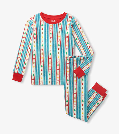 Kids holiday pajama set with striped gingerbread, candy cane, tree and ornament print and red cuffs