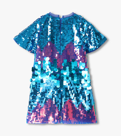 Back view of girls sequin dress with flutter sleeves and keyhole button closure in blue and purple tones