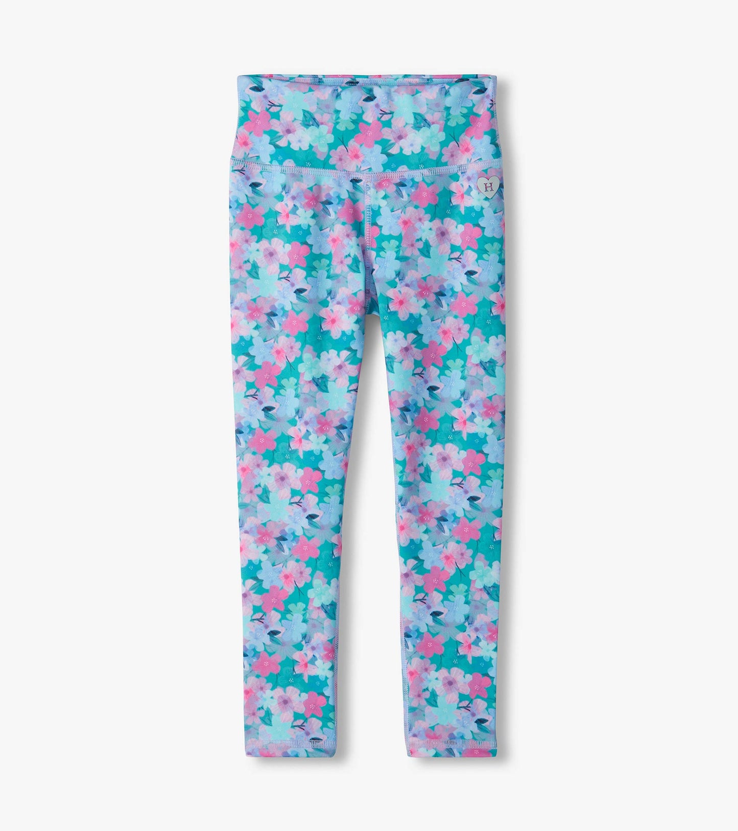 Kids active leggings with a teal background and pink, lilac, and light blue floral print