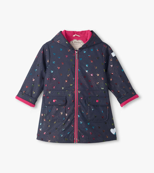 Front view of kids navy hooded rain coat with rainbow foil cherry print, pink lining, zip front, and flap pockets