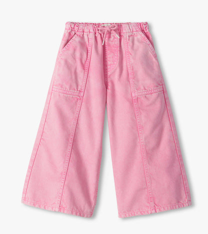 Front view of flamingo pink wide leg jeans with elastic drawstring waist and front patch pockets