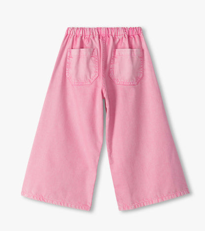 Back view of flamingo pink wide leg jeans with elastic waist and two back patch pockets