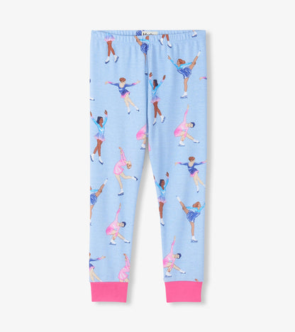 Light blue pajama pants with figure skater print and bright pink ankle cuffs