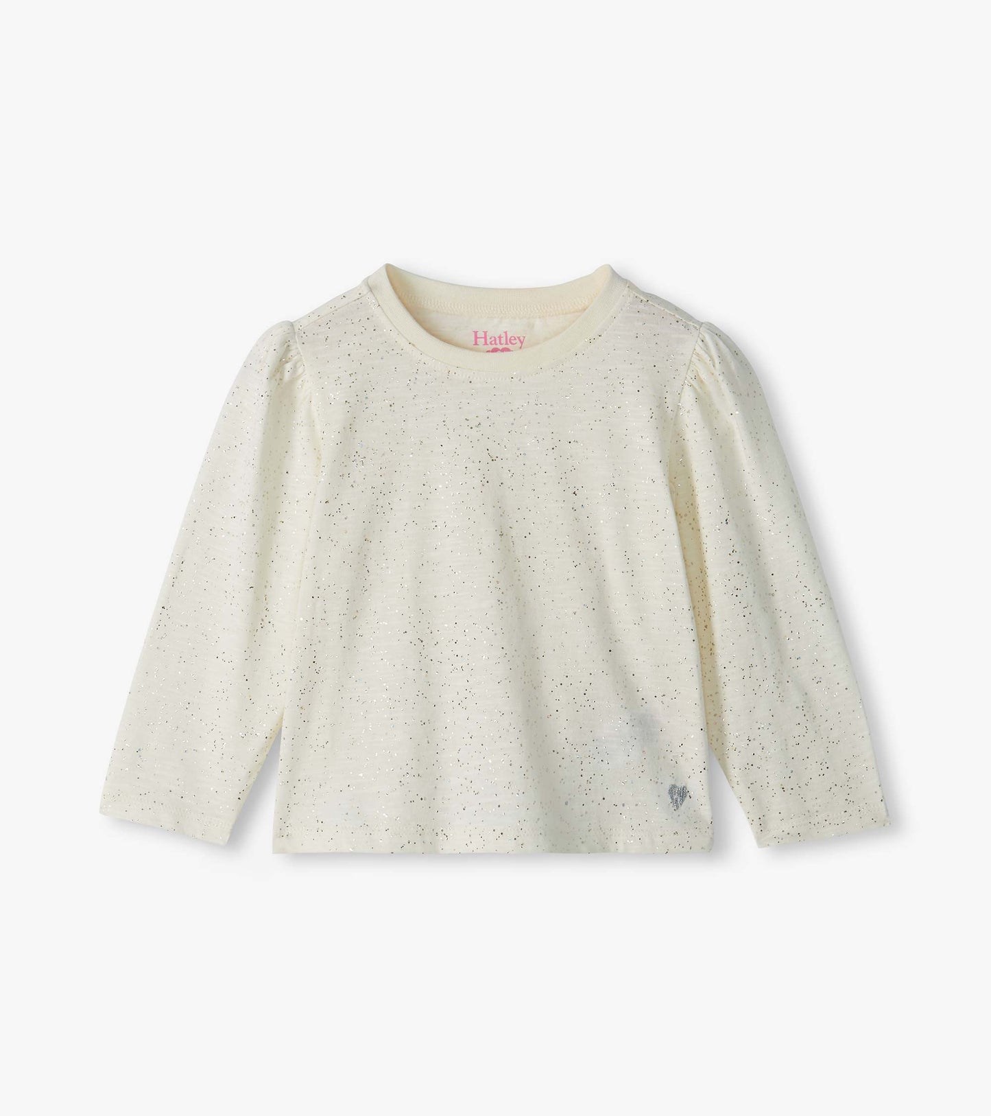 Front view of cream infant tee with silver speckles, puff shoulders, long sleeves, and small heart at hem